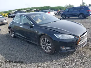 2014 Tesla Model S 60 z VIN 5YJSA1H12EFP53787, wystawiony jako IAAI lot #42279493 z przebiegiem 168 859 mil mil oraz . Historia ofert i sprzedaży dostępna na DreamBid. Obrazek 1.