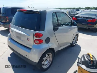 2008 Smart fortwo Pure with VIN WMEEJ31X68K106096, listed as a IAAI auction lot 42456471 with 92,074 mi miles and . Bid and sale history available at DreamBid. Image 4.