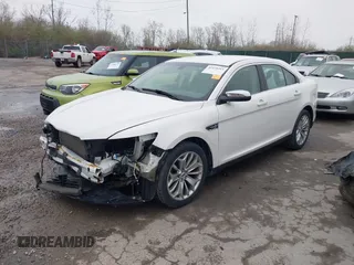 2015 Ford Taurus Limited with VIN 1FAHP2F85FG117635, listed as a IAAI auction lot 41979311 with 104,314 mi miles. Bid and sale history available at carsss.com. Image 18.