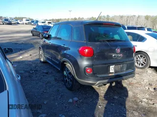 2014 FIAT 500L Trekking with VIN ZFBCFADHXEZ018139, listed as a IAAI auction lot 41224953 with 175,727 mi miles and . Bid and sale history available at DreamBid. Image 3.