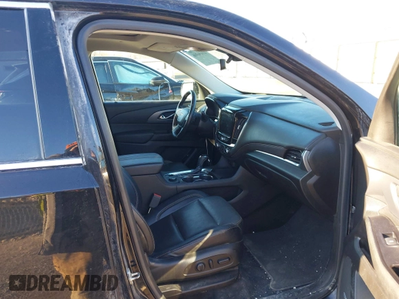 2018 Chevrolet Traverse Premier z VIN 1GNEVJKW5JJ174261, wystawiony jako IAAI lot #41656906 z przebiegiem 101 908 mil mil oraz . Historia ofert i sprzedaży dostępna na DreamBid. Obrazek 5.