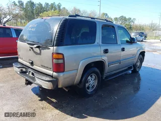 2002 Chevrolet Tahoe LT with VIN 1GNEC13Z72R281538, listed as a IAAI auction lot 41692881 with 188,140 mi miles. Bid and sale history available at carsss.com. Image 4.