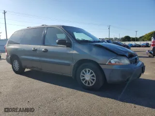 2001 Ford Windstar Wagon LX with VIN 2FMZA51441BA35669, listed as a Copart auction lot 73283214 with 240,538 mi miles and Salvage Title. Bid and sale history available at carsss.com. Image 4.