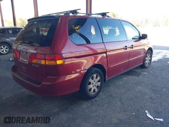 2004 Honda Odyssey EX-L with VIN 5FNRL18994B048661, listed as a IAAI auction lot 41758209 with 295,737 mi miles and . Bid and sale history available at DreamBid. Image 4.