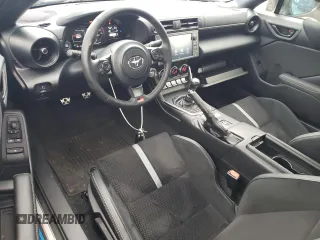 2023 Toyota GR86 Premium with VIN JF1ZNBE18P9758590, listed as a Copart auction lot 86137454 with 13,479 mi miles and Salvage Title. Bid and sale history available at carsss.com. Image 8.