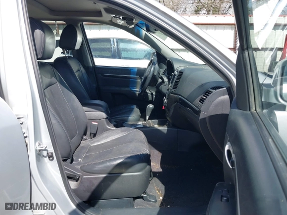 2009 Hyundai Santa Fe SE with VIN 5NMSH13E99H300552, listed as a IAAI auction lot 41772584 with 155,127 mi miles. Bid and sale history available at carsss.com. Image 5.