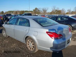 2007 Toyota Avalon XL with VIN 4T1BK36B97U243415, listed as a IAAI auction lot 41356904 with 127,873 mi miles. Bid and sale history available at carsss.com. Image 3.