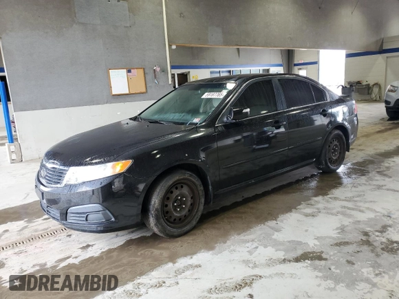 2009 Kia Optima LX z VIN KNAGE228595302847, wystawiony jako Copart lot #59187765 z przebiegiem 235 667 mil mil oraz Czysty tytuł • Clean title. Historia ofert i sprzedaży dostępna na DreamBid. Obrazek 1.