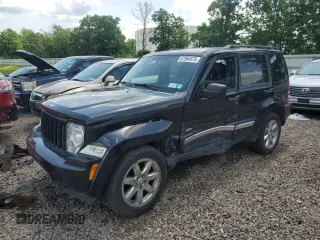 2012 Jeep Liberty Sport with VIN 1C4PJMAK9CW182088, listed as a Copart auction lot 61964575 with 107,911 mi miles and Salvage title. Bid and sale history available at DreamBid. Image 1.