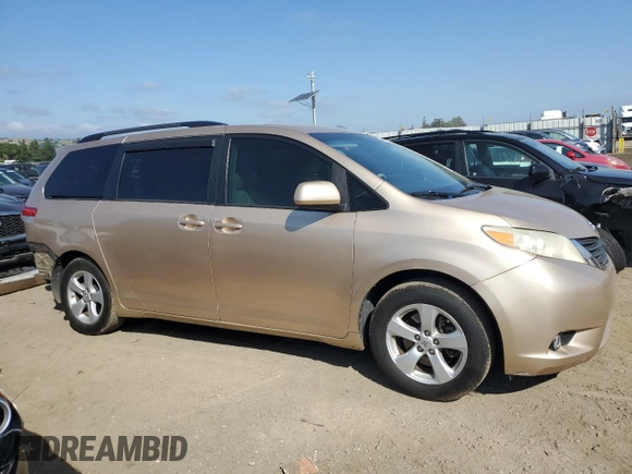 2011 Toyota Sienna LE AAS with VIN 5TDKK3DC6BS086570, listed as a Copart auction lot 54724385 with 157,530 mi miles and Salvage Title. Bid and sale history available at DreamBid. Image 4.