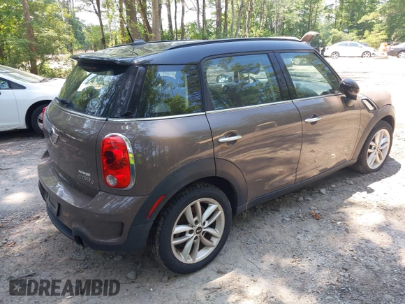 2012 MINI Countryman S with VIN WMWZC5C57CWL62344, listed as a IAAI auction lot 42576587 with 191,597 mi miles and . Bid and sale history available at DreamBid. Image 4.
