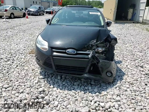 2012 Ford Focus SE z VIN 1FAHP3K22CL161005, wystawiony jako Copart lot #60203865 z przebiegiem 154 396 mil mil oraz Szkoda całkowita • Salvage title. Historia ofert i sprzedaży dostępna na DreamBid. Obrazek 13.