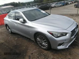 2019 Infiniti Q50 Luxe with VIN JN1EV7AR5KM551200, listed as a IAAI auction lot 42708979 with 97,710 mi miles and . Bid and sale history available at DreamBid. Image 1.