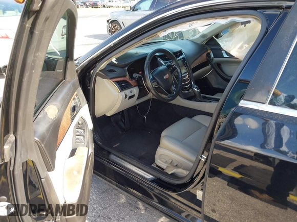 2015 Cadillac CTS RWD with VIN 1G6AP5SX8F0140364, listed as a IAAI auction lot 42535236 with 126,277 mi miles and . Bid and sale history available at DreamBid. Image 5.