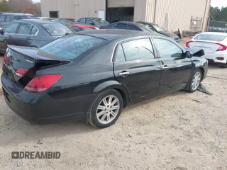 2008 Toyota Avalon XL with VIN 4T1BK36BX8U261200, listed as a IAAI auction lot 40973174 with 248,038 mi miles. Bid and sale history available at carsss.com. Image 4.