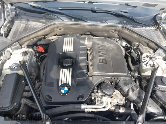 2011 BMW 7 Series 740i with VIN WBAKA4C59BC392365, listed as a IAAI auction lot 41618732 with 142,270 mi miles. Bid and sale history available at carsss.com. Image 10.
