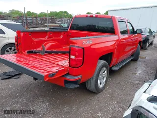 2017 Chevrolet Silverado 1500 LT with VIN 3GCUKREC6HG327304, listed as a IAAI auction lot 41918774 with 149,878 mi miles. Bid and sale history available at carsss.com. Image 4.