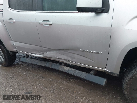 2017 GMC Canyon 2WD SLE with VIN 1GTG5CEA7H1211415, listed as a IAAI auction lot 41954800 with 145,609 mi miles. Bid and sale history available at carsss.com. Image 6.