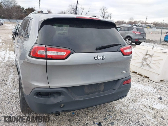 2016 Jeep Cherokee 75th Anniversary with VIN 1C4PJLCB1GW297555, listed as a IAAI auction lot 41232269 with 257,033 mi miles. Bid and sale history available at carsss.com. Image 16.