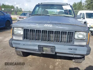 1995 Jeep Cherokee SE with VIN 1J4FT28SXSL639064, listed as a IAAI auction lot 42245489 with 171,443 mi miles and . Bid and sale history available at DreamBid. Image 6.