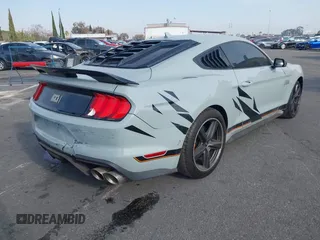 2023 Ford Mustang Mach 1 with VIN 1FA6P8R02P5502244, listed as a IAAI auction lot 41409445 with 12,573 mi miles and . Bid and sale history available at DreamBid. Image 4.