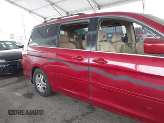 2005 Honda Odyssey EX with VIN 5FNRL38485B411954, listed as a IAAI auction lot 42039034 with 220,966 mi miles. Bid and sale history available at carsss.com. Image 6.