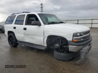 2003 Chevrolet Tahoe LS z VIN 1GNEC13T03J203176, wystawiony jako Copart lot #49501875 z przebiegiem 186 529 mil mil oraz Szkoda całkowita • Salvage title. Historia ofert i sprzedaży dostępna na DreamBid. Obrazek 4.