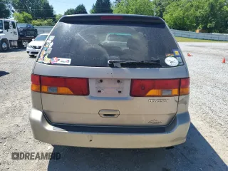 2004 Honda Odyssey LX with VIN 5FNRL18574B102634, listed as a Copart auction lot 54669075 with 141,057 mi miles and Salvage title. Bid and sale history available at DreamBid. Image 6.