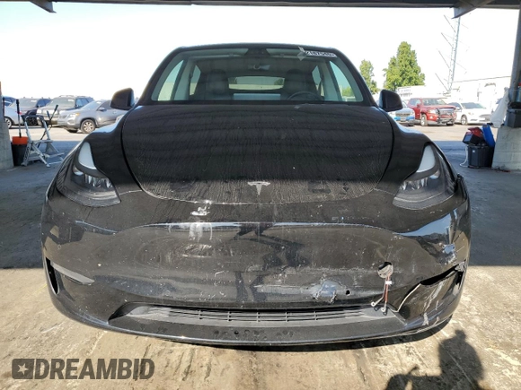 2022 Tesla Model Y Performance with VIN 7SAYGDEF5NF339965, listed as a Copart auction lot 62187545 with 93,156 mi miles and Salvage title. Bid and sale history available at DreamBid. Image 5.