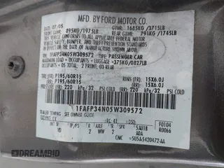 2005 Ford Focus S with VIN 1FAFP34N05W309572, listed as a IAAI auction lot 41861194 with 216,943 mi miles. Bid and sale history available at carsss.com. Image 9.