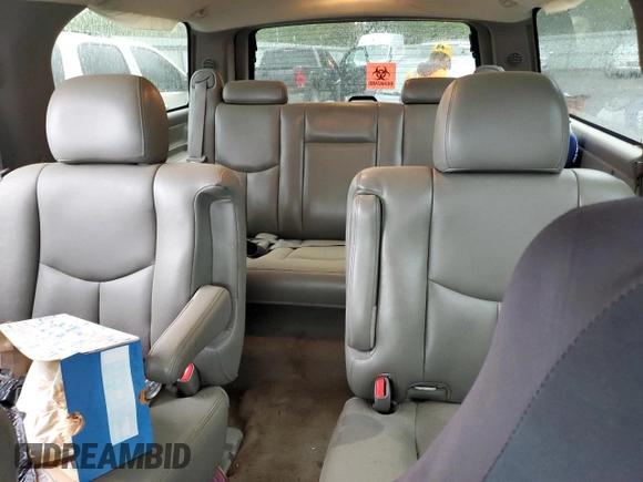 2005 GMC Yukon XL SLE z VIN 1GKEC16Z25J175610, wystawiony jako Copart lot #51051785 z przebiegiem 271 619 mil mil oraz Szkoda całkowita • Salvage title. Historia ofert i sprzedaży dostępna na DreamBid. Obrazek 10.