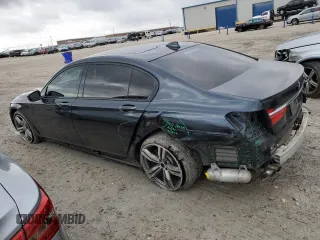 2018 BMW 7 Series 750i with VIN WBA7F0C55JGM23795, listed as a Copart auction lot 81168143 with 114,285 mi miles and Salvage Title. Bid and sale history available at carsss.com. Image 2.
