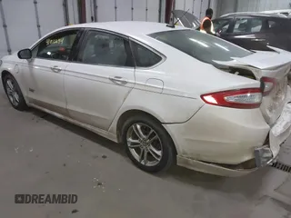 2016 Ford Fusion Titanium with VIN 3FA6P0SU8GR259163, listed as a IAAI auction lot 41812294 with 151,002 mi miles and . Bid and sale history available at DreamBid. Image 3.