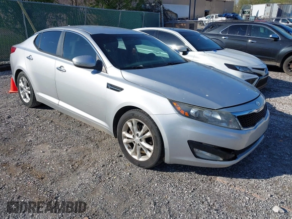 2013 Kia Optima LX with VIN 5XXGM4A79DG199785, listed as a IAAI auction lot 42015820 with 137,202 mi miles. Bid and sale history available at carsss.com. Image 1.