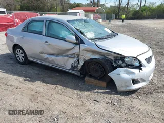 2010 Toyota Corolla with VIN 1NXBU4EE9AZ235172, listed as a IAAI auction lot 41914215 with 176,924 mi miles. Bid and sale history available at carsss.com. Image 1.