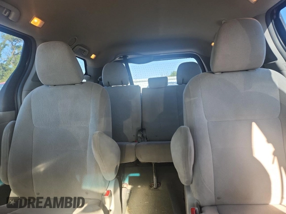 2015 Toyota Sienna L with VIN 5TDZK3DC6FS609767, listed as a Copart auction lot 61188585 with 136,286 mi miles and Salvage title. Bid and sale history available at DreamBid. Image 10.