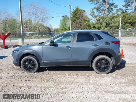 2023 Mazda CX-30 2.5 S Carbon Edition with VIN 3MVDMBCM5PM528946, listed as a IAAI auction lot 41882936 with 62,815 mi miles. Bid and sale history available at carsss.com. Image 14.