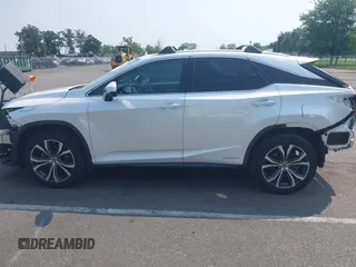 2020 Lexus RX 450h с VIN 2T2HGMDAXLC052802, выставлен на аукционе IAAI как лот 42422920 с пробегом 63 609 миль миль и . История ставок и продаж доступна на DreamBid. Изображение 14.