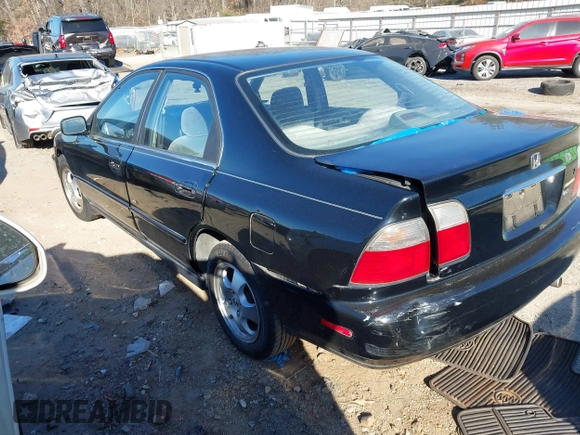 1997 Honda Accord LX with VIN 1HGCD5638VA126447, listed as a IAAI auction lot 41192082 with Not Provided miles and . Bid and sale history available at carsss.com. Image 3.