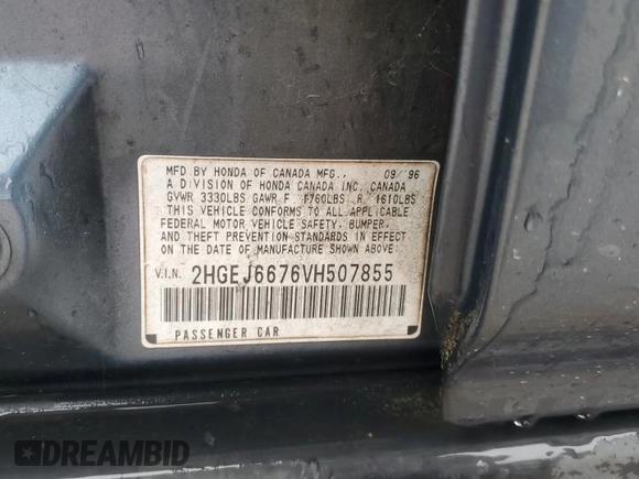 1997 Honda Civic LX z VIN 2HGEJ6676VH507855, wystawiony jako Copart lot #56684455 z przebiegiem 185 498 mil mil oraz Szkoda całkowita • Salvage title. Historia ofert i sprzedaży dostępna na DreamBid. Obrazek 12.
