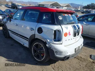 2014 MINI Countryman John Cooper Works with VIN WMWXD1C55EWS34510, listed as a IAAI auction lot 41409043 with 93,313 mi miles and . Bid and sale history available at DreamBid. Image 3.
