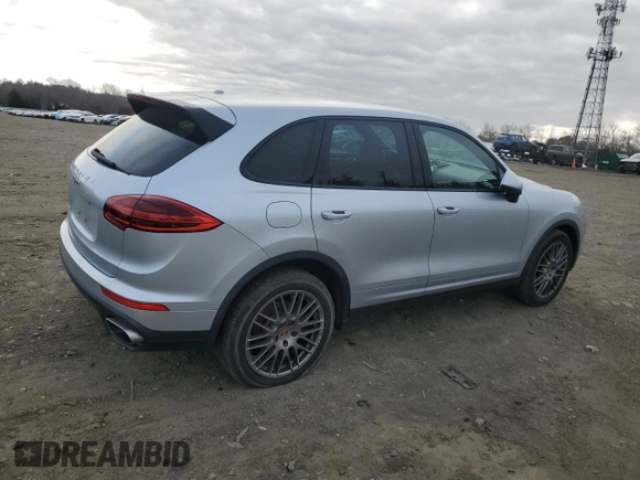 2016 Porsche Cayenne with VIN WP1AA2A28GLA02616, listed as a Copart auction lot 46328705 with 49,257 mi miles and Salvage Title. Bid and sale history available at carsss.com. Image 3.