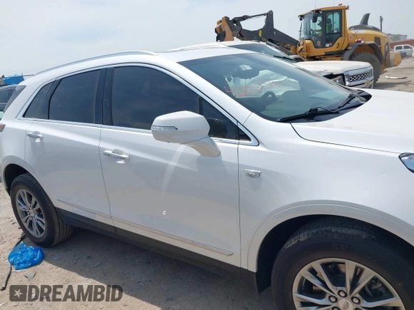 2021 Cadillac XT5 FWD Premium Luxury z VIN 1GYKNCR42MZ174309, wystawiony jako IAAI lot #42051341 z przebiegiem 75 544 mil mil oraz . Historia ofert i sprzedaży dostępna na DreamBid. Obrazek 13.