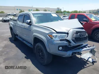 2020 Toyota Tacoma SR5 with VIN 3TMBZ5DN7LM025500, listed as a IAAI auction lot 42651731 with 54,879 mi miles and . Bid and sale history available at DreamBid. Image 1.