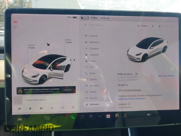 2020 Tesla Model 3 Long Range with VIN 5YJ3E1EBXLF636963, listed as a IAAI auction lot 41826249 with 68,085 mi miles. Bid and sale history available at carsss.com. Image 18.