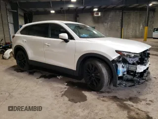 2023 Mazda CX-9 Touring Plus with VIN JM3TCBAY4P0653310, listed as a Copart auction lot 42734995 with 18,236 mi miles and Salvage title. Bid and sale history available at DreamBid. Image 4.