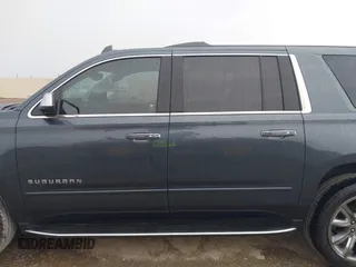 2020 Chevrolet Suburban Premier with VIN 1GNSCJKC8LR290783, listed as a IAAI auction lot 42636126 with 59,371 mi miles and . Bid and sale history available at DreamBid. Image 14.