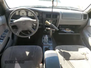 2003 Toyota Tacoma PreRunner z VIN 5TEGM92N43Z281269, wystawiony jako Copart lot #77200284 z przebiegiem 279 039 mil mil oraz Szkoda całkowita • Salvage title. Historia ofert i sprzedaży dostępna na DreamBid. Obrazek 8.
