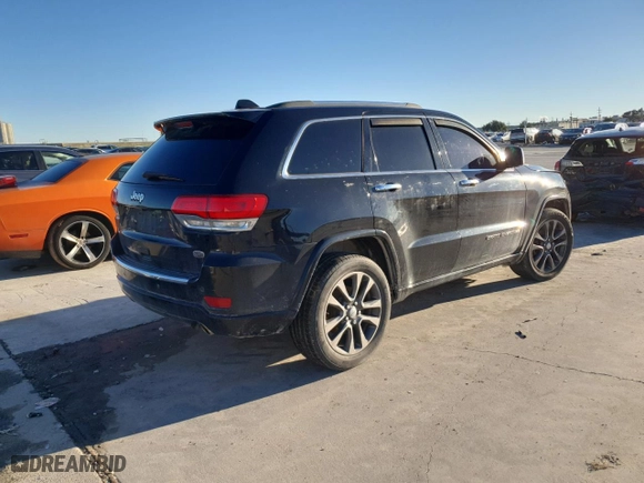 2017 Jeep Grand Cherokee Overland with VIN 1C4RJECGXHC659417, listed as a Copart auction lot 80168894 with 118,934 mi miles and Salvage Title. Bid and sale history available at carsss.com. Image 3.