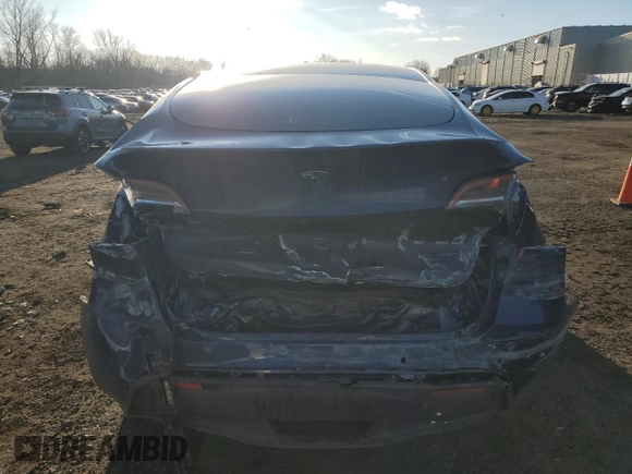 2021 Tesla Model Y Long Range with VIN 5YJYGAEE2MF262571, listed as a Copart auction lot 47309485 with 57,431 mi miles and Salvage Title. Bid and sale history available at carsss.com. Image 6.
